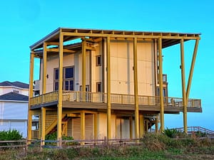 Two story beach house that looks quite a bit nicer than the other ones closer to town.