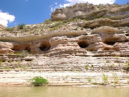These limestone caves, carved right into the rock walls, are along the banks of the Verde River.