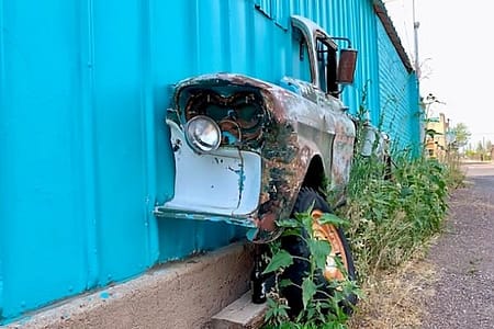 Continuing our search for interesting attractions on Route 66 in Arizona, we have Seligman. In this picture, there is half of a truck, mounted to the outer wall of a building.