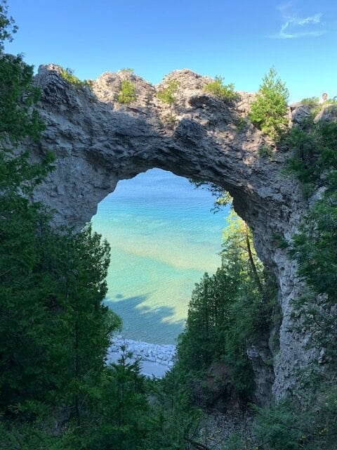 A huge hole in a rock, making it look like an archway.