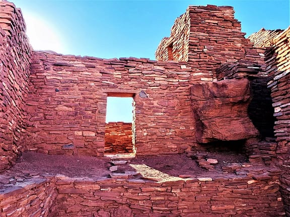 The second spot on our list of finding interesting attractions on Route 66 in Arizona: Wupatki Indian Ruins. In this picture, Bricks aligned to make rooms with openings for doors and windows, but there is no roof.