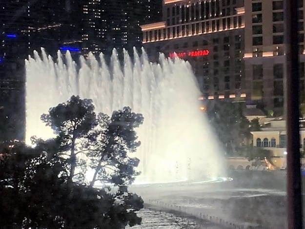 The Fountains at the Bellagio Hotel: Tall white spires of water dance in a circle.