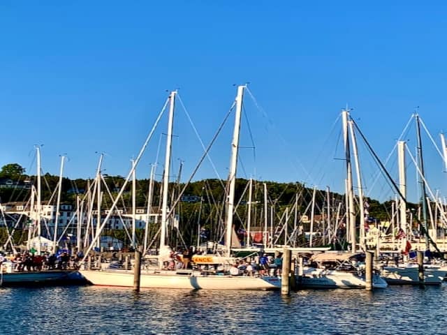 These sail boats are docked at mackinac island