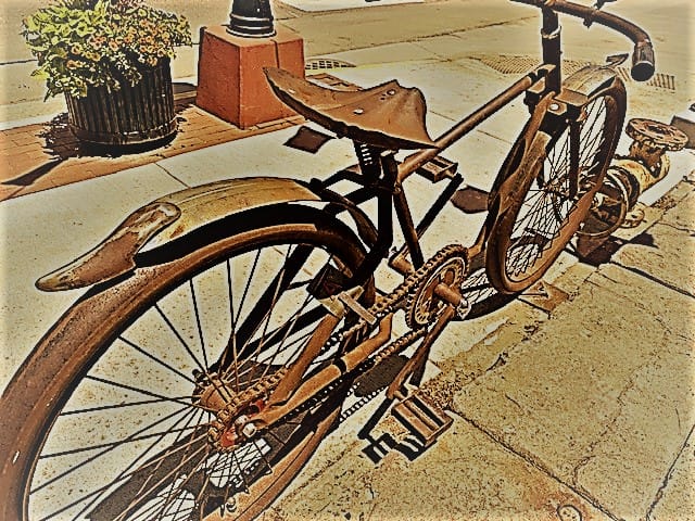 A replica of a bicycle, but it's made of oxidized iron. Very realistic, including a playing card clipped to the frame so it makes noise in the spokes of the wheel.