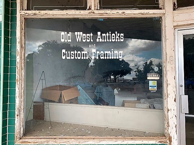 The Antique store spells their name ANTIEKS. "Old west antieks and custom framing"