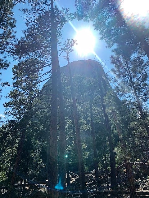 Devils Tower National Monument with the sun directly over it